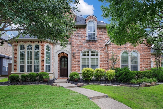 1331 Crockett Dr, Frisco, TX 75033 - view of front of property with a front yard and brick siding