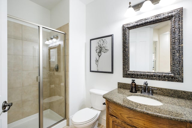 1331 Crockett Dr, Frisco, TX 75033 - bathroom featuring toilet, vanity, and a shower stall