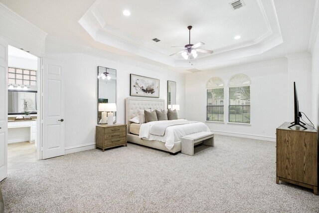 1331 Crockett Dr, Frisco, TX 75033 - carpeted bedroom with ornamental molding, a raised ceiling, recessed lighting, connected bathroom, and baseboards