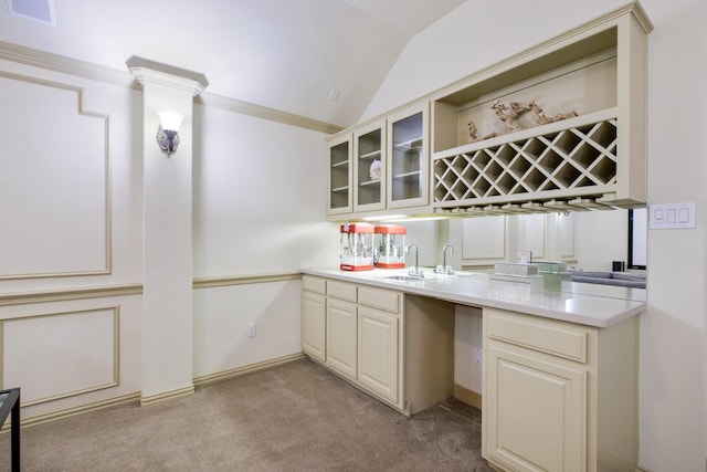 1331 Crockett Dr, Frisco, TX 75033 - indoor wet bar featuring lofted ceiling, light colored carpet, and ornamental molding