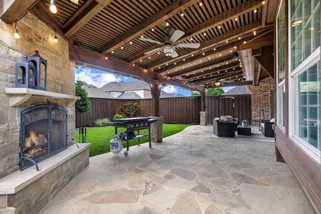 1331 Crockett Dr, Frisco, TX 75033 - view of patio / terrace featuring an outdoor stone fireplace and ceiling fan