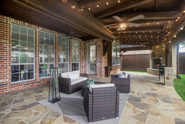 1331 Crockett Dr, Frisco, TX 75033 - view of patio / terrace with a ceiling fan and an outdoor living space with a fireplace