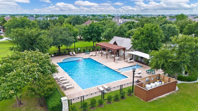 1331 Crockett Dr, Frisco, TX 75033 - community pool with a patio area and view of scattered trees