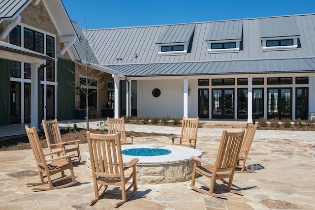4229 Palomino Rd, Aubrey, TX 76227 - view of patio featuring an outdoor fire pit