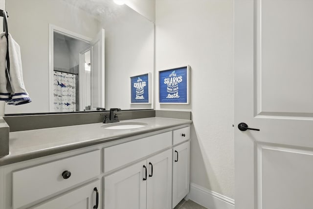 125 Chisholm Trl, Highland Village, TX 75077 - bathroom featuring vanity and baseboards