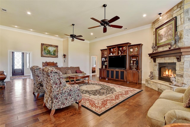 128 Whispering Winds Dr, Gunter, TX 75058 - living room featuring a fireplace, ornamental molding, ceiling fan, dark wood-style floors, and recessed lighting