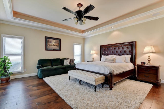 128 Whispering Winds Dr, Gunter, TX 75058 - bedroom with a raised ceiling, dark wood-type flooring, baseboards, crown molding, and a ceiling fan