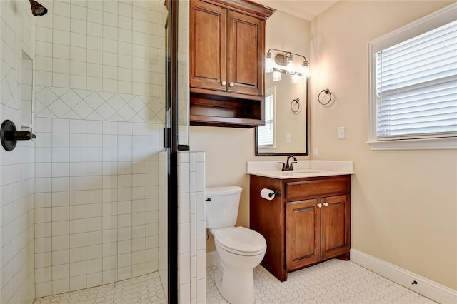 128 Whispering Winds Dr, Gunter, TX 75058 - bathroom featuring a shower stall, vanity, toilet, and healthy amount of natural light