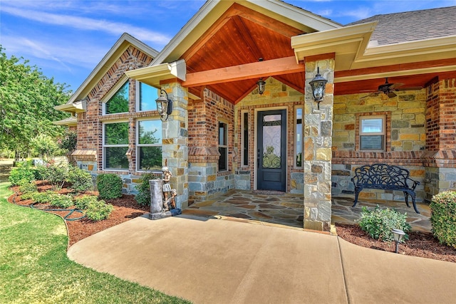 128 Whispering Winds Dr, Gunter, TX 75058 - property entrance with stone siding, brick siding, and ceiling fan