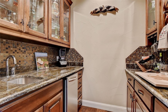128 Whispering Winds Dr, Gunter, TX 75058 - indoor bar with tasteful backsplash, baseboards, and stainless steel dishwasher