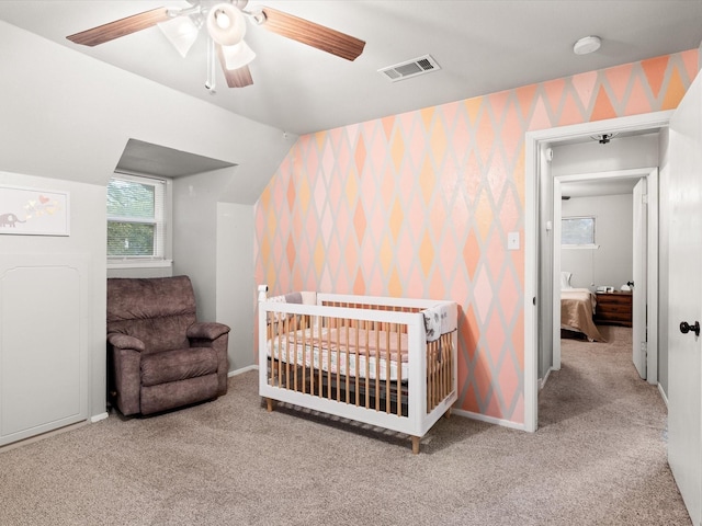 536 Nathan St, Burleson, TX 76028 - bedroom featuring wallpapered walls, carpet, vaulted ceiling, ceiling fan, and a nursery area