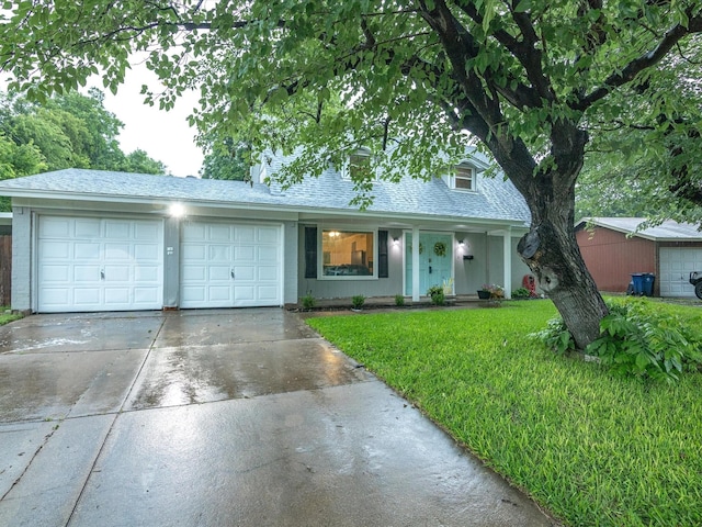 536 Nathan St, Burleson, TX 76028 - view of front facade with a front yard, a garage, and concrete driveway