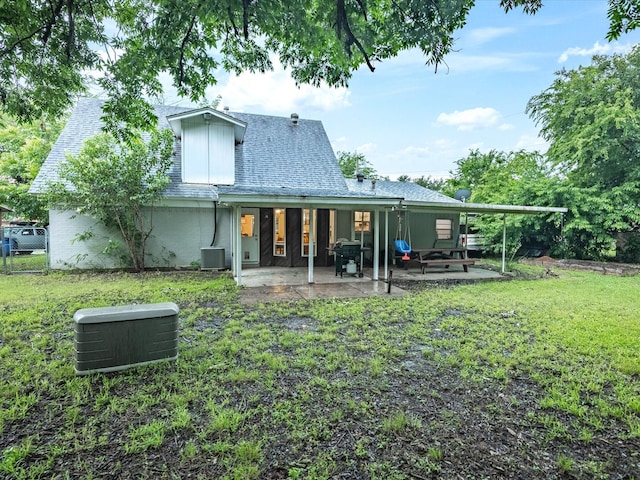 536 Nathan St, Burleson, TX 76028 - rear view of property with a yard, a patio area, and roof with shingles
