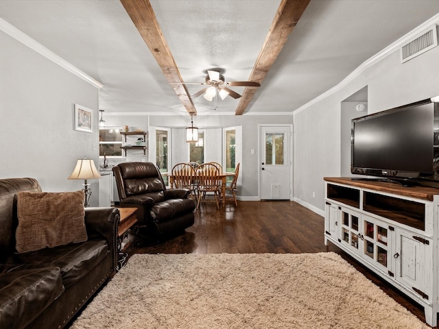 536 Nathan St, Burleson, TX 76028 - living room with a ceiling fan, wood finished floors, beam ceiling, and crown molding
