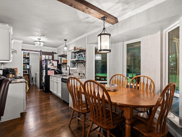 536 Nathan St, Burleson, TX 76028 - dining space with a barn door, dark wood-style floors, beamed ceiling, and crown molding
