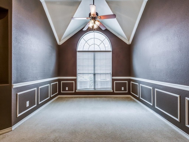 3604 Camino Trl, Mckinney, TX 75070 - carpeted empty room featuring ceiling fan, crown molding, vaulted ceiling, wainscoting, and a textured wall