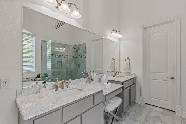 10933 Smoky Oak Trl, Flower Mound, TX 76226 - full bath with vanity, a stall shower, a chandelier, and marble finish floors