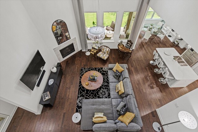 10933 Smoky Oak Trl, Flower Mound, TX 76226 - living area with wood finished floors and a towering ceiling