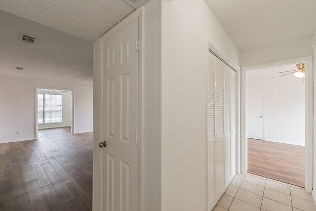920 Turtle Cv Unit 252, Irving, TX 75060 - corridor with light wood-style flooring