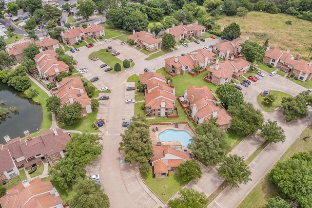 920 Turtle Cv Unit 252, Irving, TX 75060 - aerial view of residential area featuring a nearby body of water and a pool