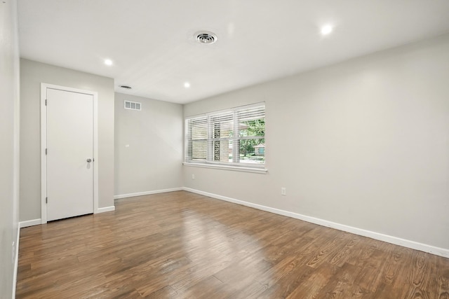 809 Harwell St, Abilene, TX 79601 - spare room with wood finished floors, baseboards, and recessed lighting
