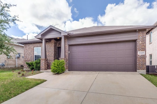 2089 Hartley Dr, Forney, TX 75126 - single story home with brick siding, driveway, a garage, and cooling unit