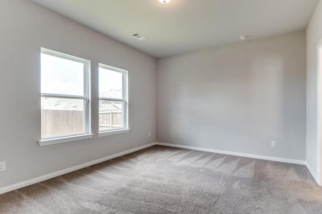 2089 Hartley Dr, Forney, TX 75126 - carpeted spare room featuring baseboards and a smoke detector