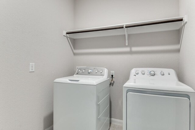 2089 Hartley Dr, Forney, TX 75126 - washroom with washer and dryer and baseboards