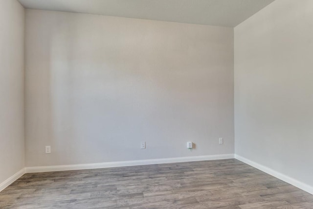 2089 Hartley Dr, Forney, TX 75126 - empty room with wood finished floors and baseboards