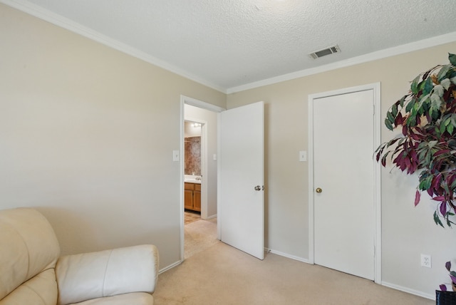1508 Haven Pl, Allen, TX 75002 - sitting room with light colored carpet, ornamental molding, baseboards, and a textured ceiling