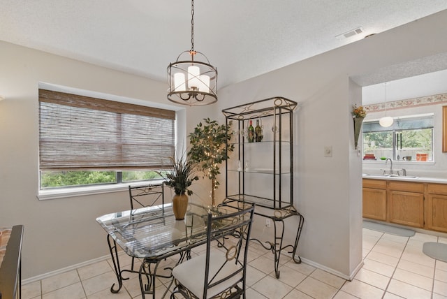 1508 Haven Pl, Allen, TX 75002 - dining room featuring plenty of natural light, baseboards, and light tile patterned flooring