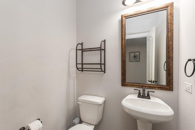 2014 Slow Stream Dr, Royse City, TX 75189 - half bath featuring toilet and a sink