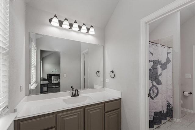 2014 Slow Stream Dr, Royse City, TX 75189 - full bath featuring vanity, tile patterned flooring, toilet, curtained shower, and lofted ceiling