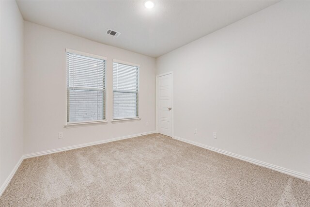 4557 Ward St, North Richland Hills, TX 76180 - unfurnished room with light colored carpet and baseboards