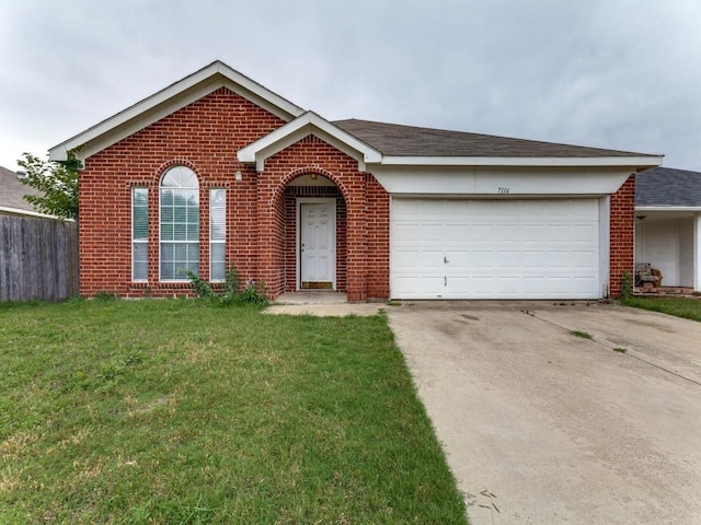 7116 Park Creek Cir E, Fort Worth, TX 76137 - view of front of house with brick siding, driveway, and a garage