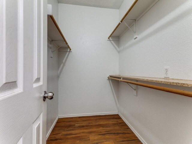 7116 Park Creek Cir E, Fort Worth, TX 76137 - spacious closet with dark wood finished floors