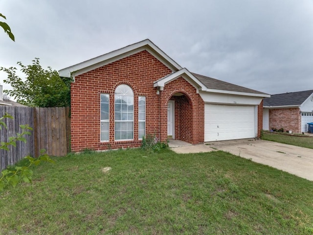 7116 Park Creek Cir E, Fort Worth, TX 76137 - view of front of home featuring brick siding, an attached garage, and driveway