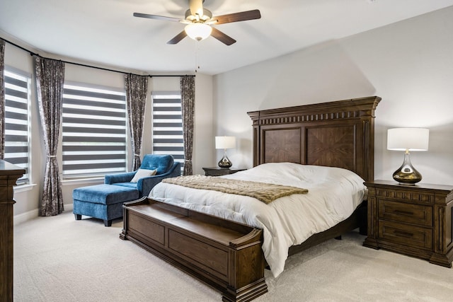 1615 Sweetwater Way, Celina, TX 75009 - bedroom featuring light carpet, multiple windows, ceiling fan, and baseboards