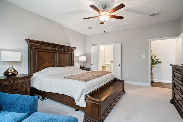 1615 Sweetwater Way, Celina, TX 75009 - bedroom with light colored carpet, ensuite bath, baseboards, and ceiling fan