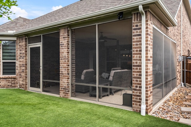 1615 Sweetwater Way, Celina, TX 75009 - rear view of property with brick siding, roof with shingles, and a sunroom