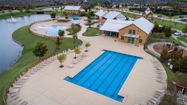 1615 Sweetwater Way, Celina, TX 75009 - community pool with a patio and a water view