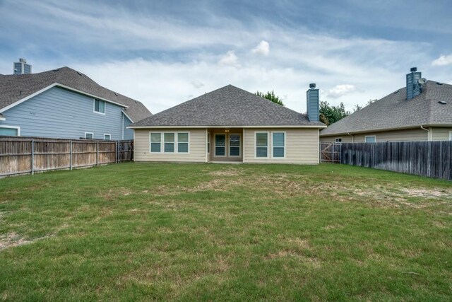 9405 Log Run Ct, Mckinney, TX 75072 - back of property featuring a chimney