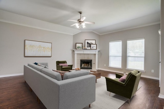9405 Log Run Ct, Mckinney, TX 75072 - living area featuring a ceiling fan, a fireplace, ornamental molding, wood finished floors, and lofted ceiling