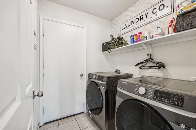 2224 Heaton St, Forney, TX 75126 - laundry area featuring washing machine and clothes dryer and light tile patterned floors