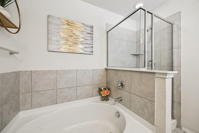 2224 Heaton St, Forney, TX 75126 - full bathroom featuring a bath and a stall shower