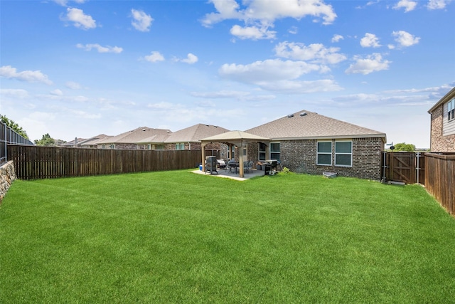 2224 Heaton St, Forney, TX 75126 - rear view of house featuring a patio, a gazebo, a shingled roof, and brick siding