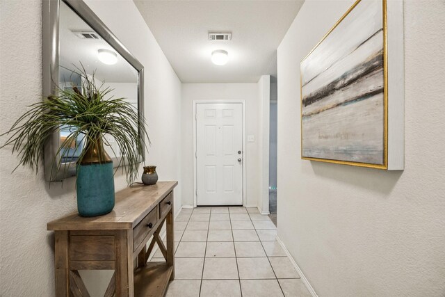 2224 Heaton St, Forney, TX 75126 - entryway with light tile patterned floors and baseboards