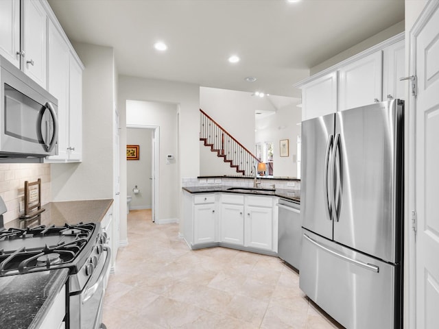4344 Kestrel Way, Carrollton, TX 75010 - kitchen with stainless steel appliances, tasteful backsplash, white cabinets, and recessed lighting