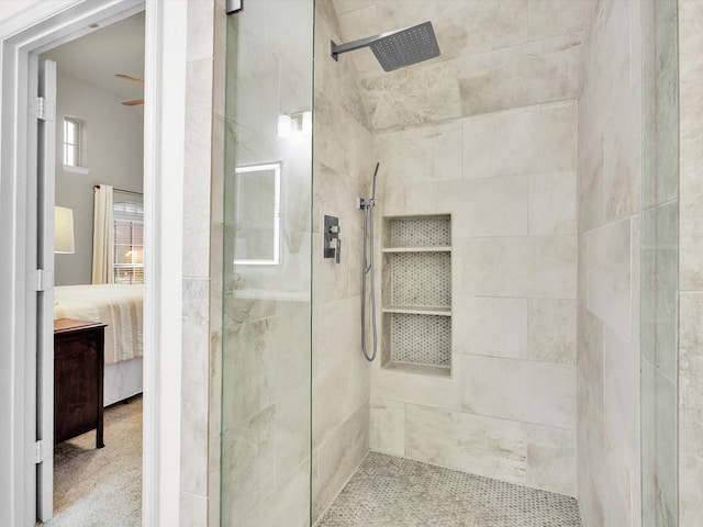 4344 Kestrel Way, Carrollton, TX 75010 - ensuite bathroom featuring tiled shower and ceiling fan
