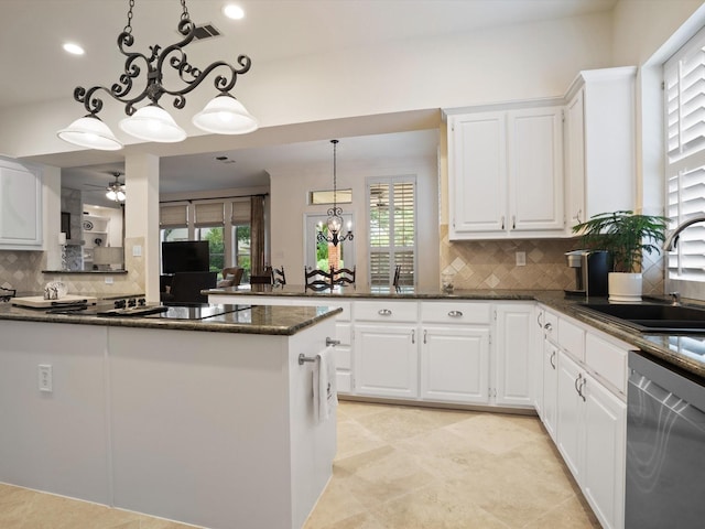 6301 Bermuda Dunes Dr, Plano, TX 75093 - kitchen with dishwasher, a peninsula, tasteful backsplash, a ceiling fan, and white cabinetry